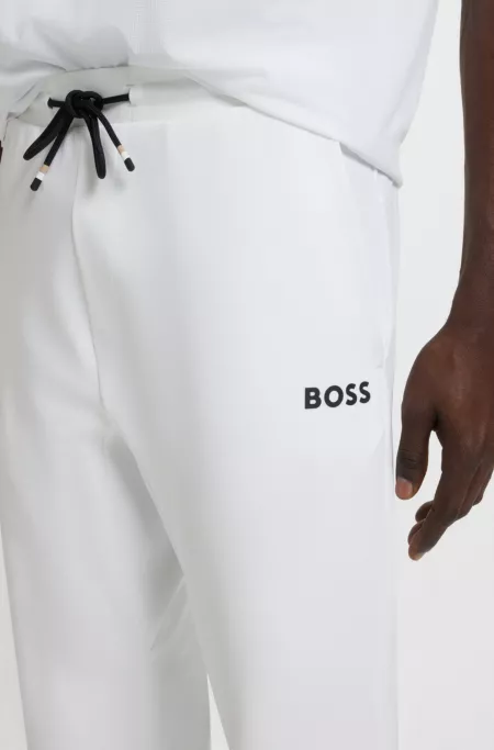 Active stretch-gabardine tracksuit bottoms with thermoregulating technology