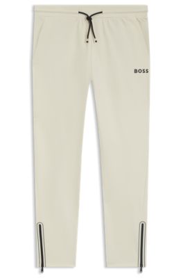 Active stretch-gabardine tracksuit bottoms with thermoregulating technology, White