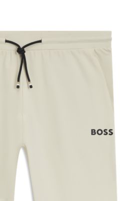 Active stretch-gabardine tracksuit bottoms with thermoregulating technology, White