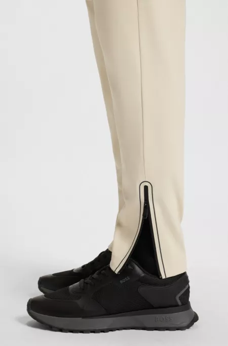 Active stretch-gabardine tracksuit bottoms with thermoregulating technology