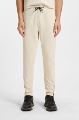 Active stretch-gabardine tracksuit bottoms with thermoregulating technology, White