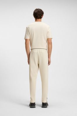 Active stretch-gabardine tracksuit bottoms with thermoregulating technology, White