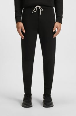 Stripe-detail tracksuit bottoms in a cotton blend, Black