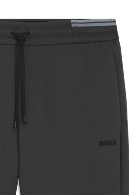 Stripe-detail tracksuit bottoms in a cotton blend, Dark Grey