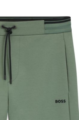 Stripe-detail tracksuit bottoms in a cotton blend, Light Green