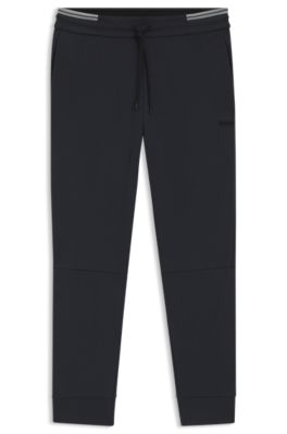 Stripe-detail tracksuit bottoms in a cotton blend, Dark Blue