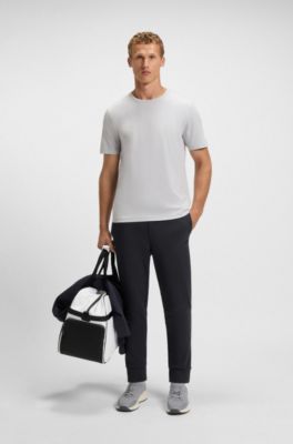 Stripe-detail tracksuit bottoms in a cotton blend, Dark Blue