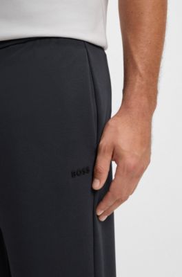 Stripe-detail tracksuit bottoms in a cotton blend, Dark Blue