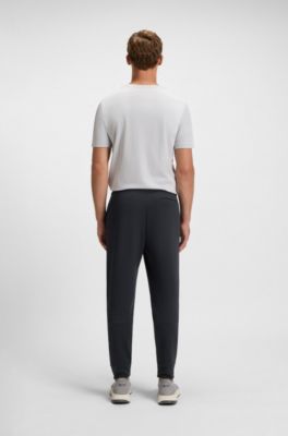 Stripe-detail tracksuit bottoms in a cotton blend, Dark Blue