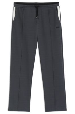 Quilted-jacquard tracksuit bottoms in a relaxed fit, Dark Grey