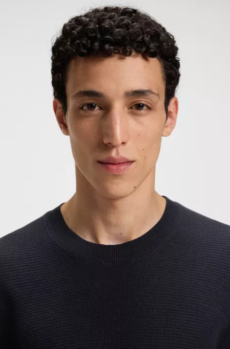 Knit sweater with mixed structures