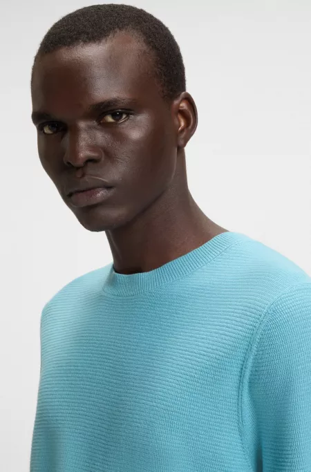 Knit sweater with mixed structures