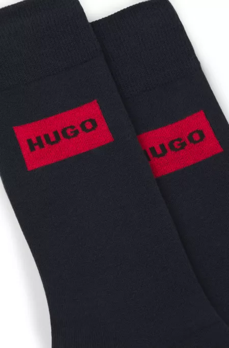 Two-pack of regular-length socks with red logo labels