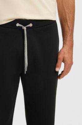 Patterned-drawcord tracksuit bottoms in a cotton blend, Black