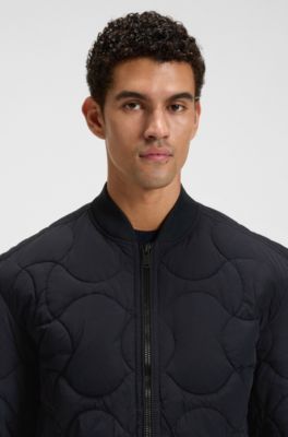 Veste d&eacute;perlante &agrave; matelassage motif losange, Bleu fonc&eacute;