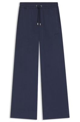 Pantalones de ch&aacute;ndal relaxed fit con logo bordado, Azul oscuro