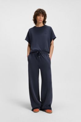 Pantalones de ch&aacute;ndal relaxed fit con logo bordado, Azul oscuro
