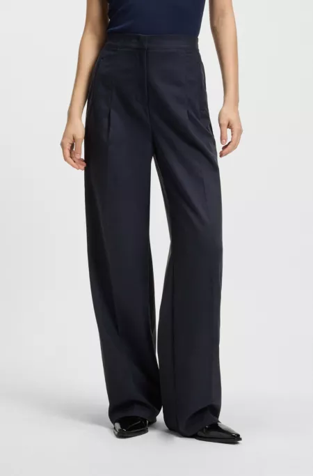 Formal trousers with pleat details
