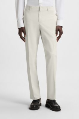 Pantalones slim fit plegables de tejido el&aacute;stico t&eacute;cnico, Blanco