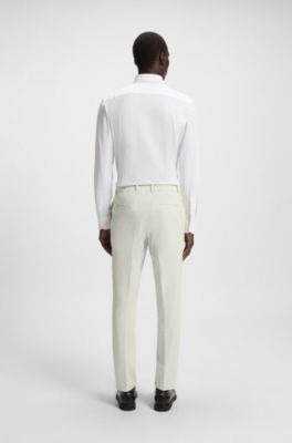 Pantalones slim fit plegables de tejido el&aacute;stico t&eacute;cnico, Blanco