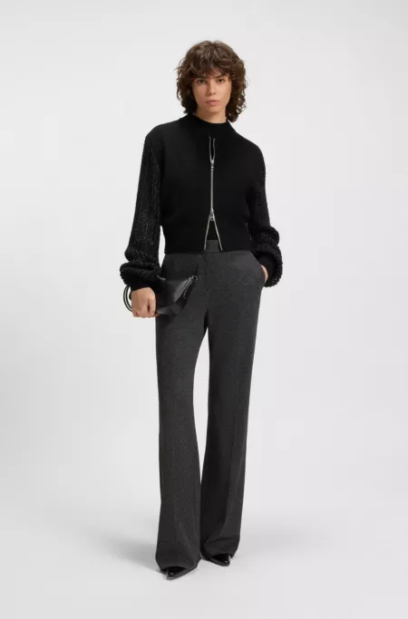 Slim-fit trousers with flared leg