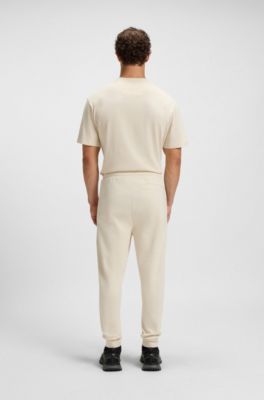 Pantalones de ch&aacute;ndal de algod&oacute;n con monograma Double&nbsp;B, Blanco