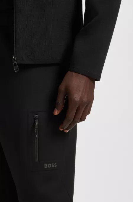 Regular-fit tracksuit bottoms with decorative reflective details