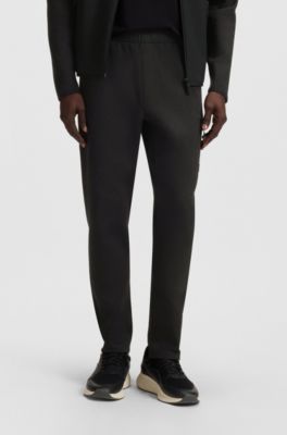 Regular-fit tracksuit bottoms with decorative reflective details, Black