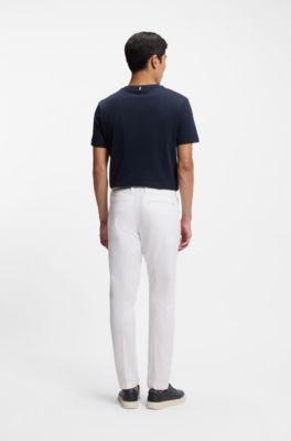 Pantalones slim fit en tejido multiel&aacute;stico, Blanco