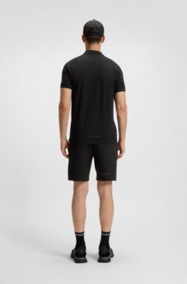 Polo con cuello con cremallera de piqu&eacute; de algod&oacute;n el&aacute;stico con absorci&oacute;n de humedad, Negro