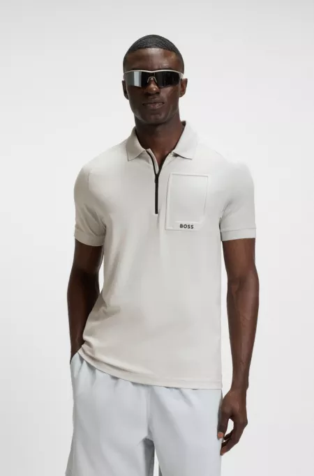 Zip-neck polo shirt in moisture-wicking fabric