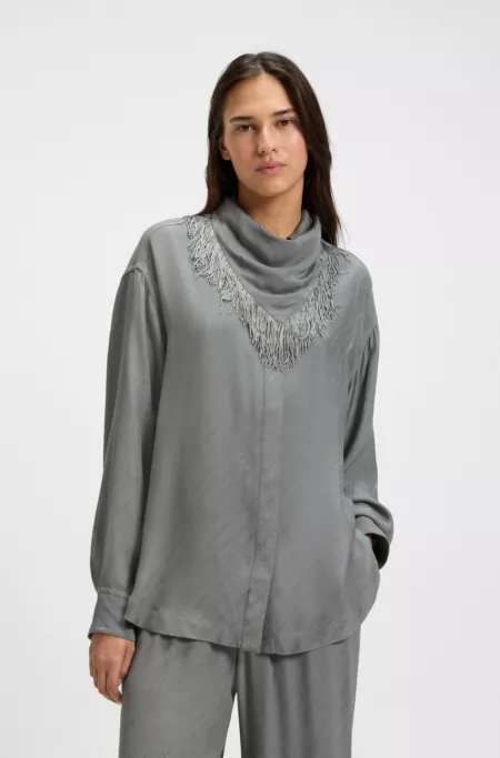 Oversized-fit blouse with fringing and logos