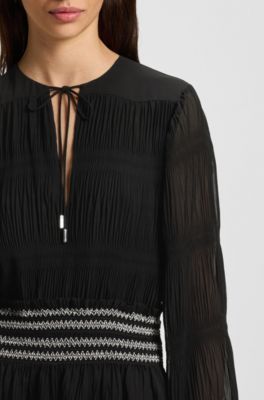 Pliss&eacute; dress with smock-stitched waistband, Black