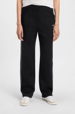Pantalones de ch&aacute;ndal de corte recto con logo en contraste y ribetes, Negro