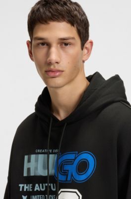 Prenda con capucha de felpa de algod&oacute;n con mezcla de estampados de dise&ntilde;o, Negro