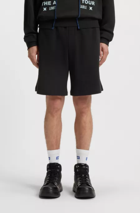 Mixed-artwork shorts in cotton terry