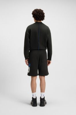 Shorts de felpa de algod&oacute;n con un dise&ntilde;o de la marca mezclado, Negro