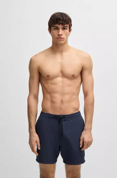 Logo-badge swim shorts with packable construction