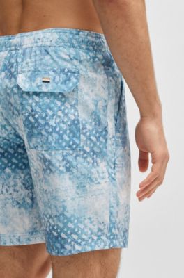 Logo-badge swim shorts with monogram artwork