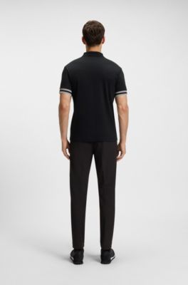 Polo slim fit de algod&oacute;n con pu&ntilde;os a rayas, Negro