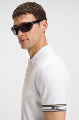 Polo slim fit de algod&oacute;n con pu&ntilde;os a rayas, Blanco