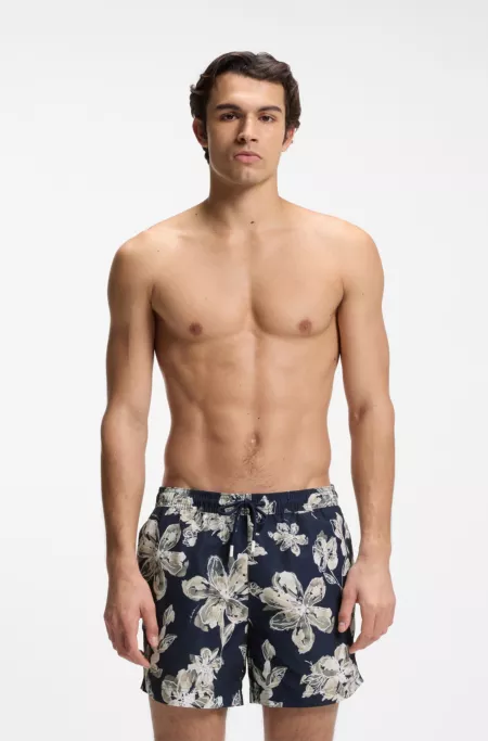 Quick-dry swim shorts with all-over print