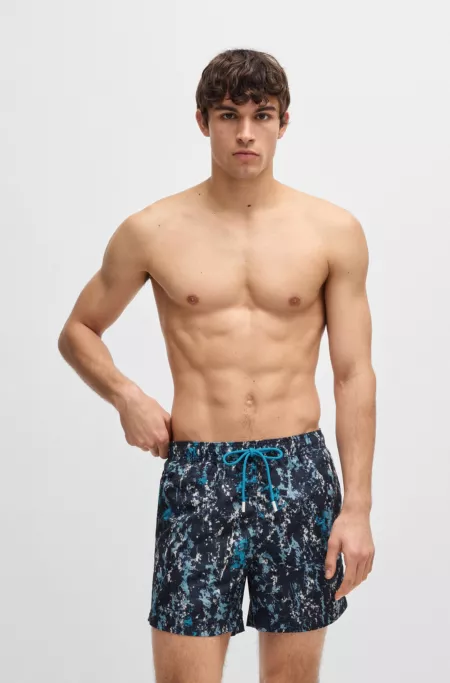 Quick-dry swim shorts with all-over print
