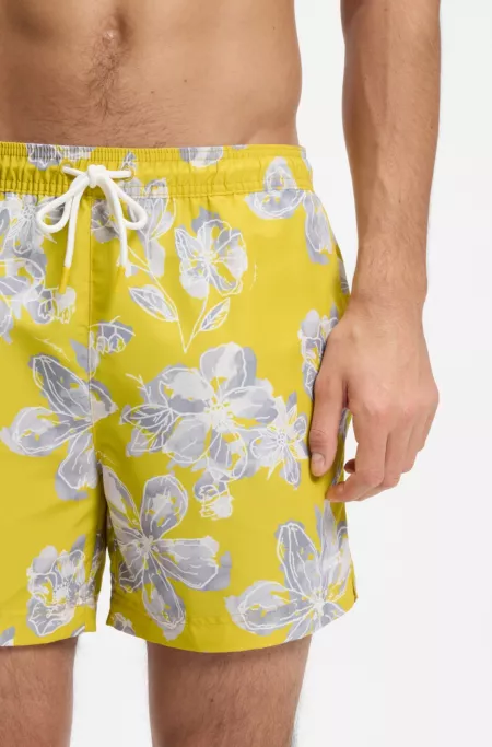 Quick-dry swim shorts with all-over print