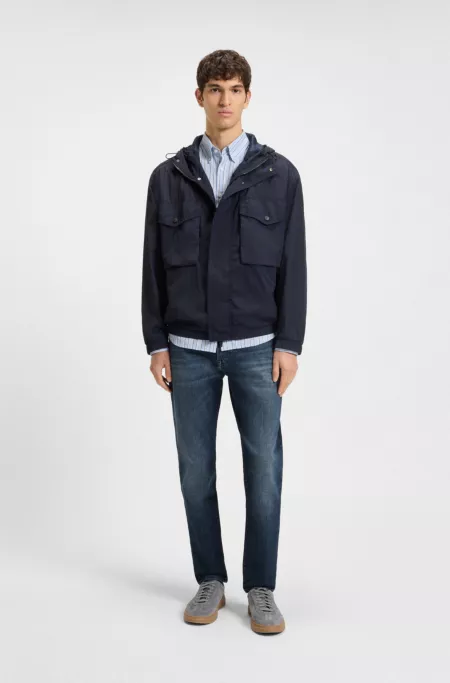 Blue tapered-fit jeans in comfort-stretch denim