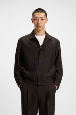 Chaqueta slim fit en pa&ntilde;o el&aacute;stico t&eacute;cnico con motivo de espiga, Marr&oacute;n