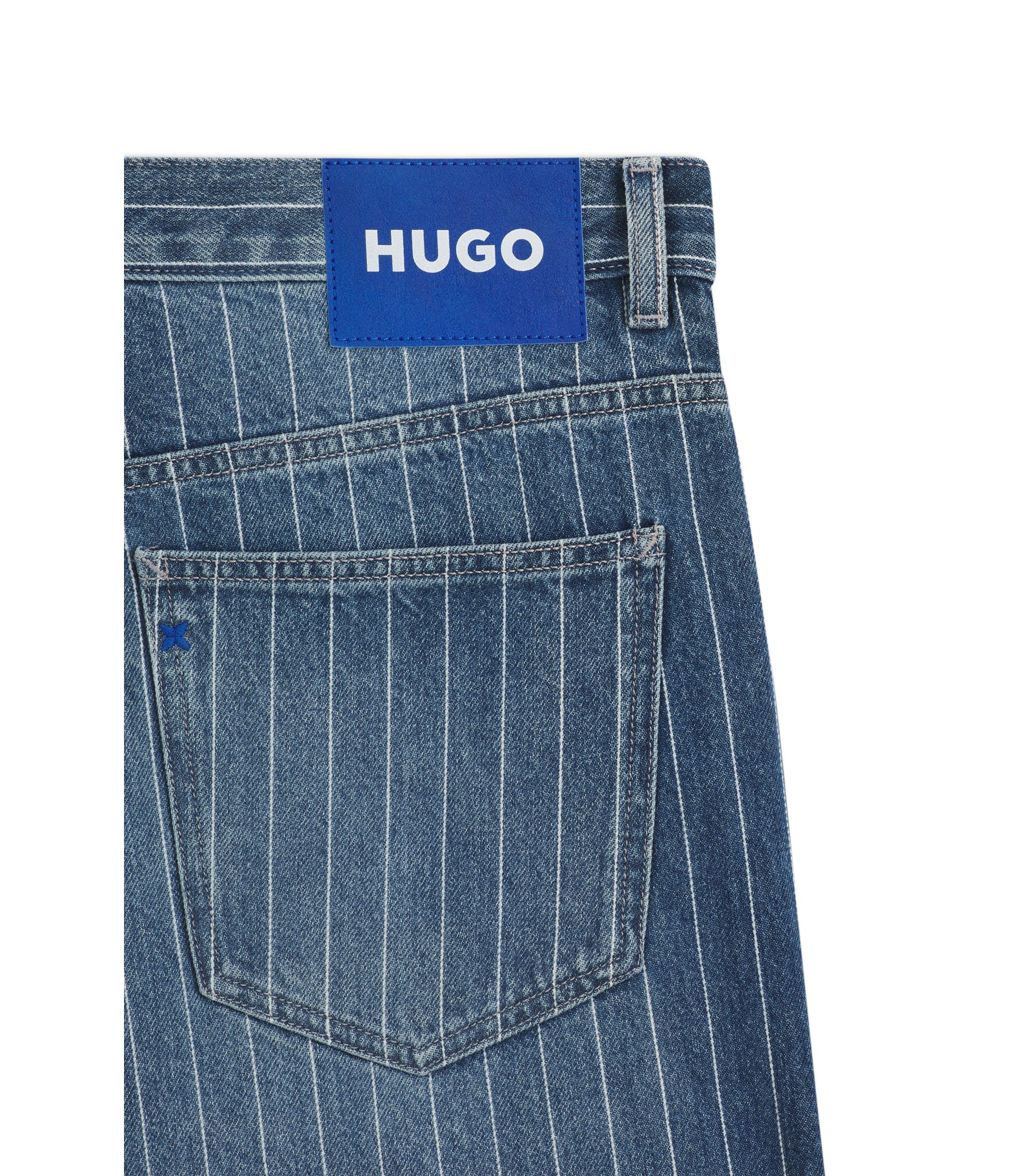 HUGO - Baggy-fit jeans in blue pinstriped denim - Blue