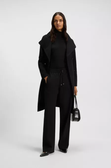 Sleeveless top in merino wool with mock neck