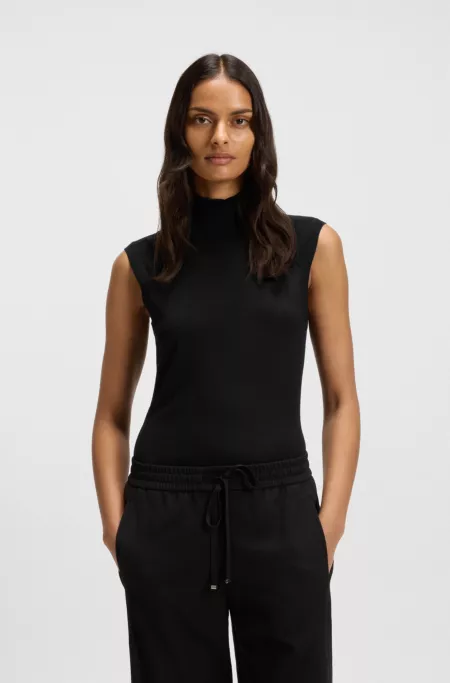 Sleeveless top in merino wool with mock neck