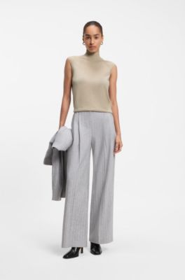 Sleeveless mock-neck sweater in merino wool, White